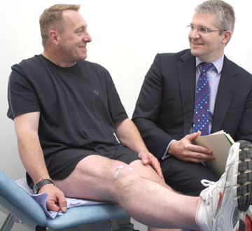 Dr (mr) adrian wilson with patient